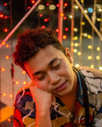 Portrait Photo of Man Closing His Eyes