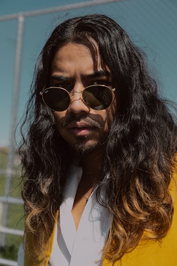 Portrait Photo of Man in Sunglasses Posing