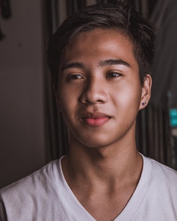 Portrait Photo of Man in White V-neck T-shirt