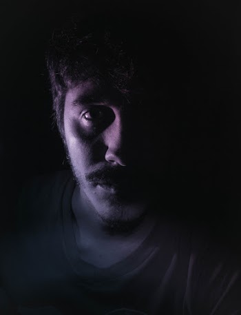 Portrait Photo of Man Wearing Gray Crew-neck Shirt