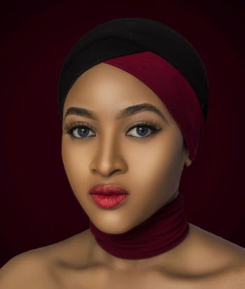 Portrait Photo of Topless Woman in Maroon and Black Headscarf and Maroon Fabric Choker