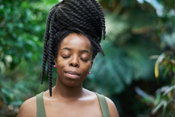Portrait Photo of Woman Closing Her Eyes