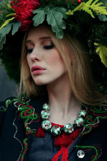 portrait photo of woman in black and red top