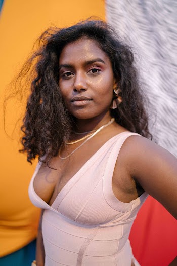Portrait Photo of Woman in Pink Tank Top Posing