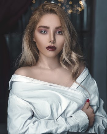 Portrait Photo of Woman in White Dress Shirt Posing