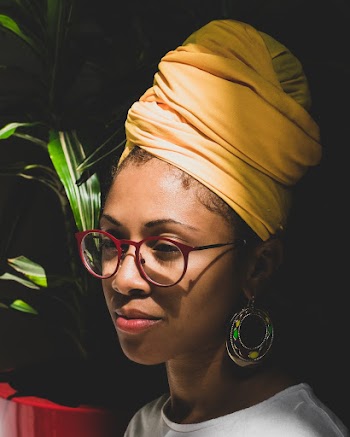 Portrait Photo of Woman in Yellow Headscarf Posing