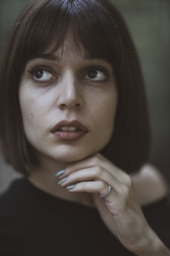 Portrait Photo of Woman Looking Upward