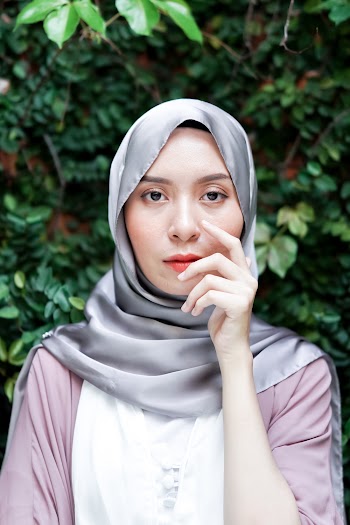 Portrait Photo of Woman Wearing Gray Hijab