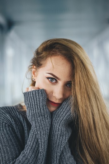 Portrait Photo of Woman Wearing Gray Sweater