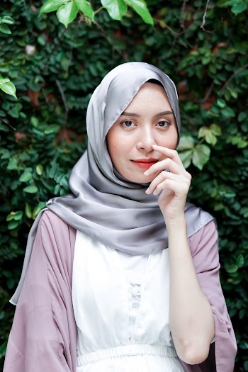 Portrait Photo of Woman Wearing Grey Hijab Scarf