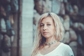 Portrait Photo of Woman Wearing White Top