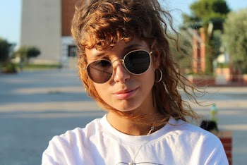 Portrait Photo of Woman Wears Black Frame Sunglasses