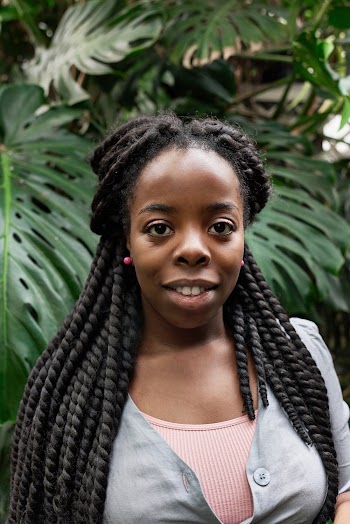 Portrait Photo of Woman With Braided Hair