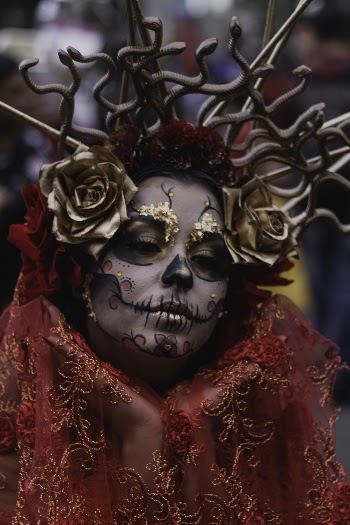 Portrait Photo of Woman With Face Art