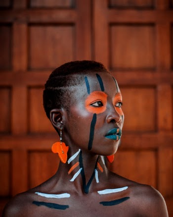 Portrait Photo of Woman with Face Paint