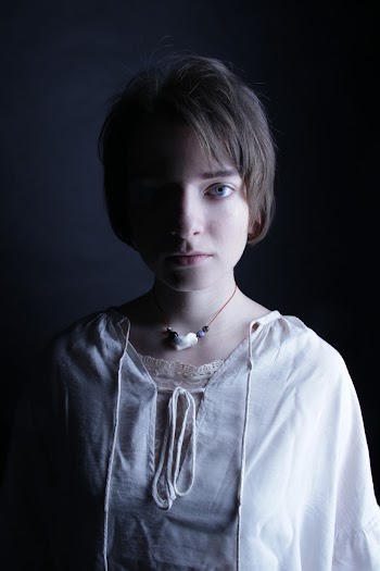 Portrait Photography of Woman Wearing White Drawstring Top