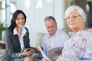 Portrait senior couple meeting with financial advisor