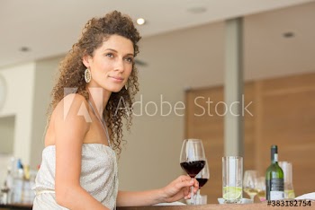 Portrait serene woman drinking red wine
