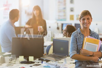 Portrait smiling creative businesswoman in office