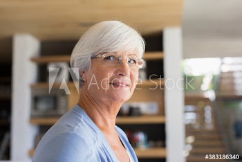 Portrait smiling senior woman in eyeglasses
