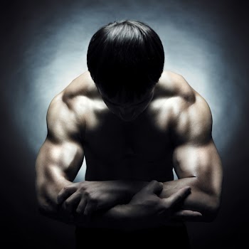 Poto of naked athlete with strong body