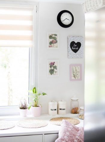 Pots Near Windowpane on White Wooden Cabinet