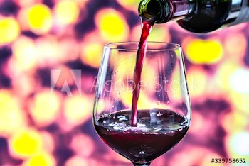 Pouring a glass of red wine