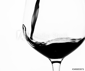 Pouring a glass of red wine