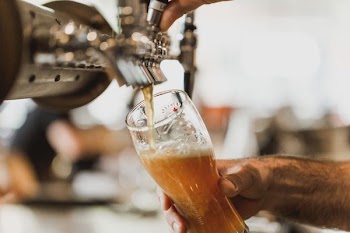 Pouring Pint Of Beer