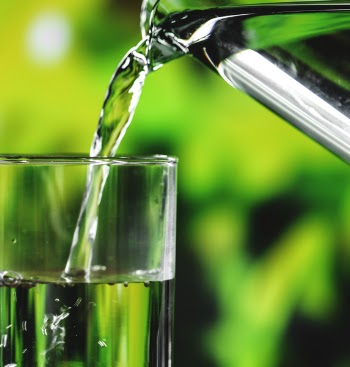 Pouring Water In Glass