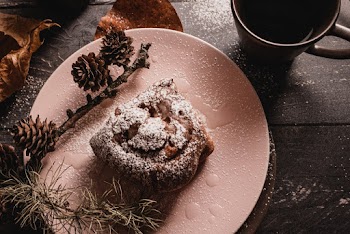 Powdered Sugar Coated Bread on Plate