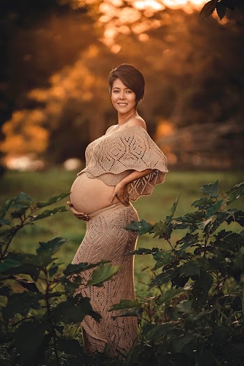 Pregnant Woman Beside Green Plants