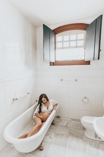 Pregnant Woman In A Bath Tub