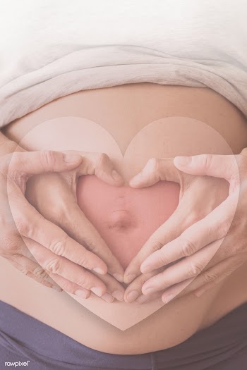Pregnant woman on a beige background | Free  illustration - 2323477