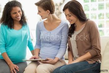 Pregnant women using digital tablet