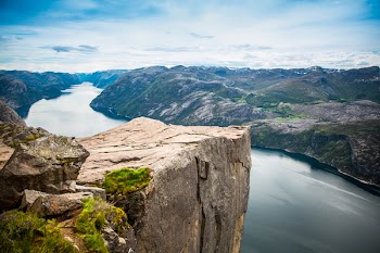 Preikestolen or Prekestolen, also known by the English translations of Preacher's Pulpit or Pulpit Rock, is a famous tourist attraction in Forsand, Ryfylke, Norway