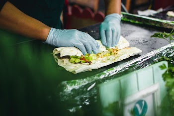 Preparing healthy wrap to go 