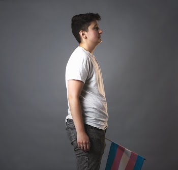Profile Shot Of Person Holding Trans Pride Flag