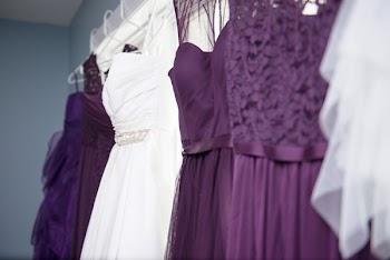 Purple And White Dresses Hanging