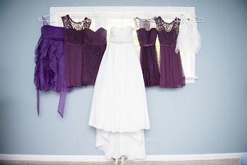Purple-and-white Dresses Hung on Closed Window
