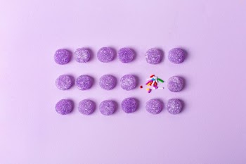 Purple Candy With Sprinkles Background