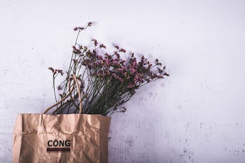 Purple Petaled Flower on Brown Cong Paper Bag