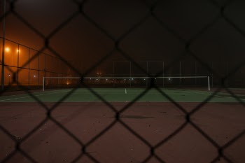 Quite Tennis Field during Nighttime