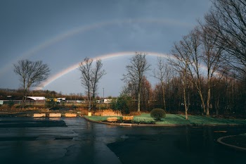 Rainbow over Houses and Trees
