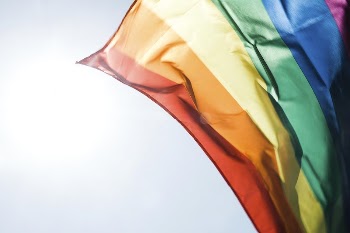 Rainbow pride flag flying in the daytime | Free Photo - rawpixel
