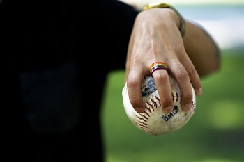 Rainbow Ring On Hand Holding Softball