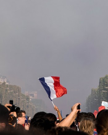 Raising the Blue, Red, and White Flag