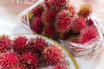 Rambutan fruits at a local | Free Photo - rawpixel