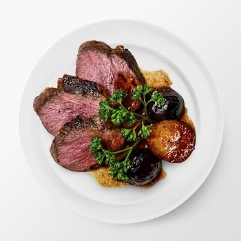 Rare cooked meat on a plate, | Free PSD - rawpixel