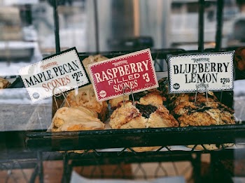 Raspberry Filled Scones at 3 Dollar, Blueberry Lemon Scones at 2.65 Dollar, and Maple Pecan Scones at 2.75 Dollar